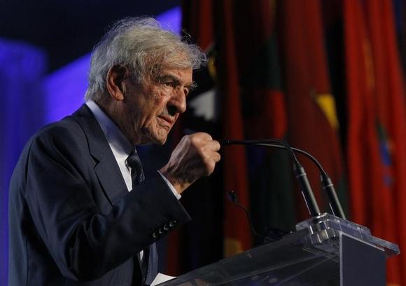 Holocaust Museum Founding Chairman Elie Wiesel speaks a ceremony commemorating the 20th anniversary of the Museum in Washington April 29, 2013. REUTERS/Gary Cameron